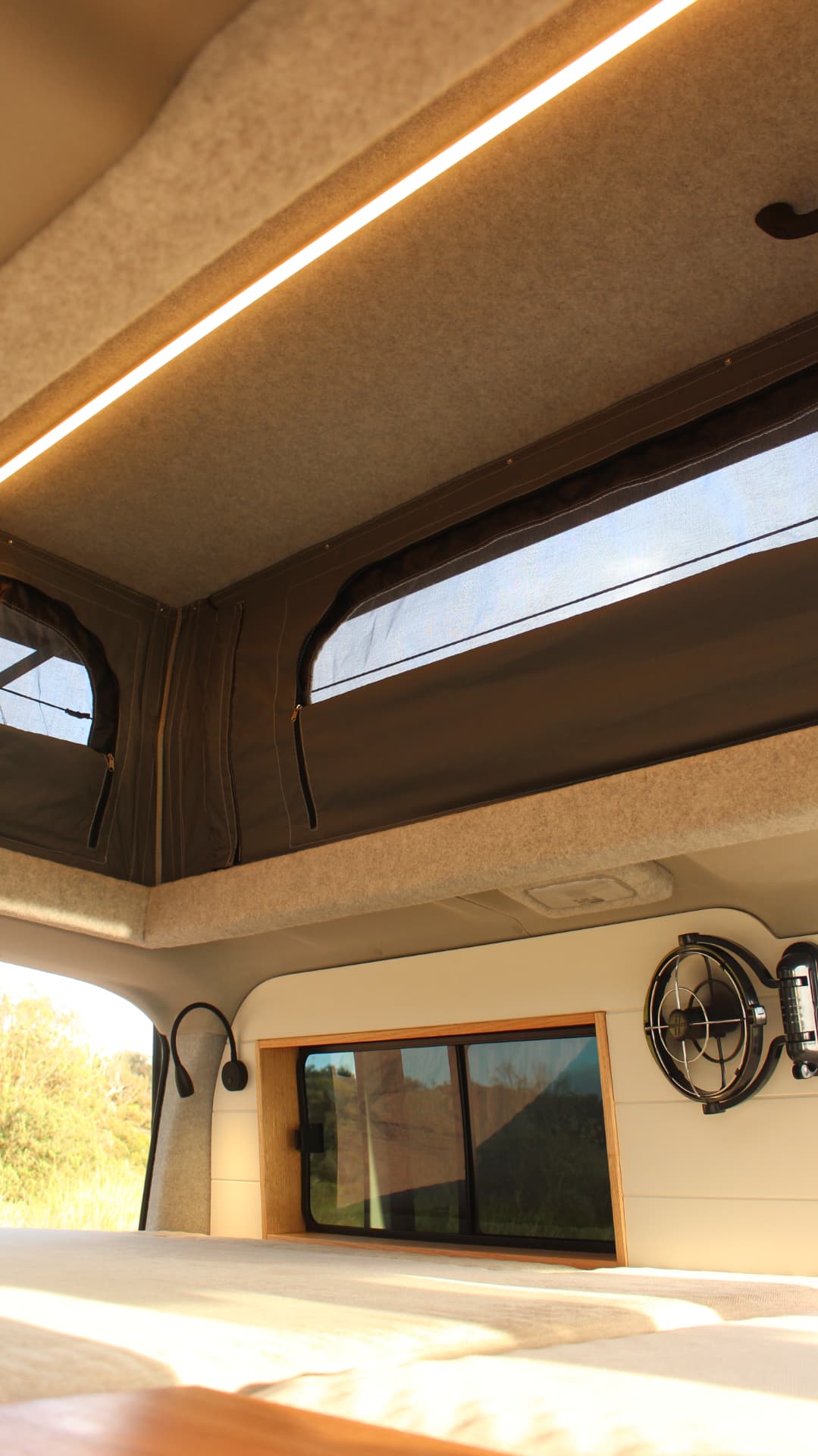 Toyota Hiace 300 Series — Inside the pop top with the LED strip on