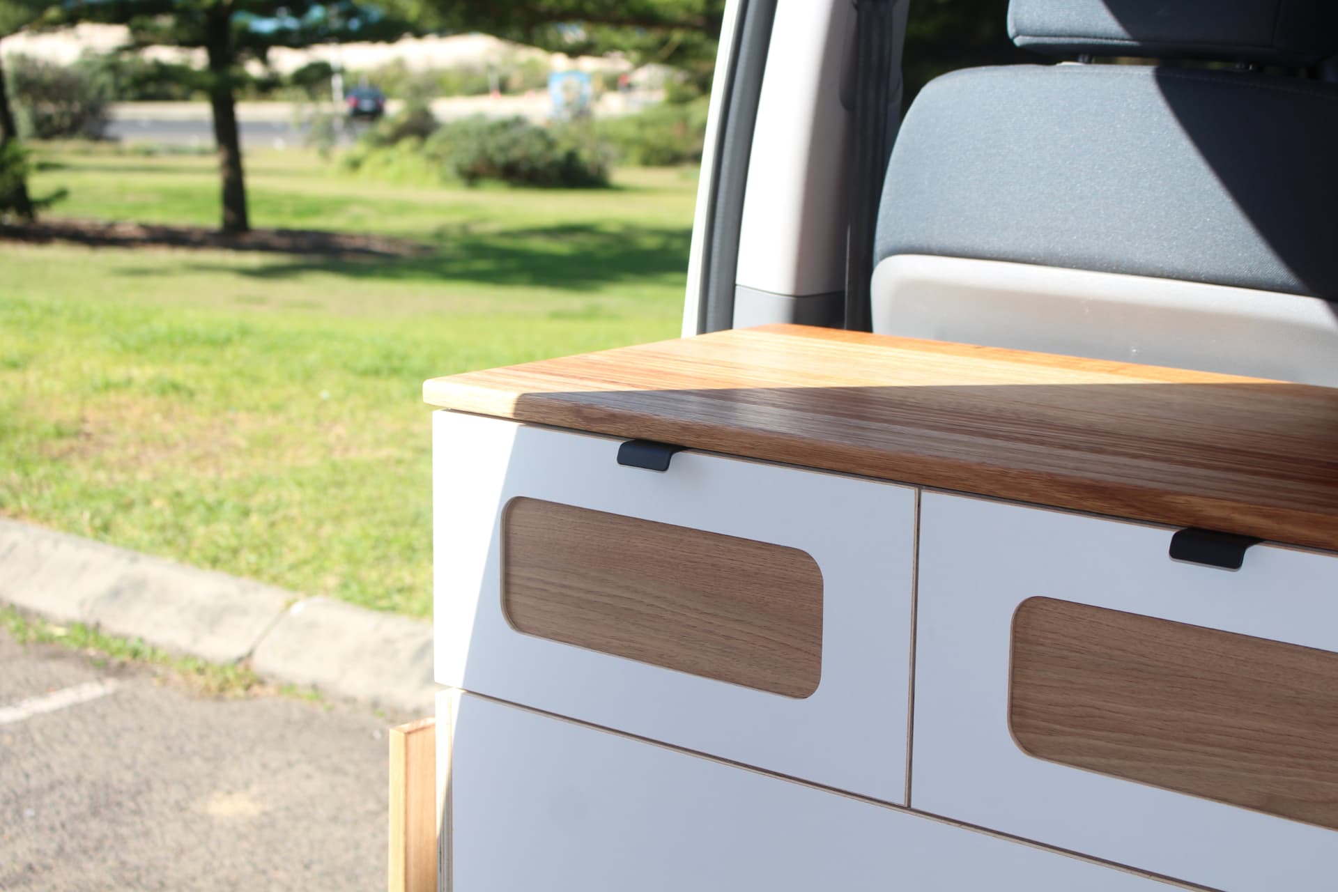 iLoad Camper — Hardwood benchtop and side door outlook