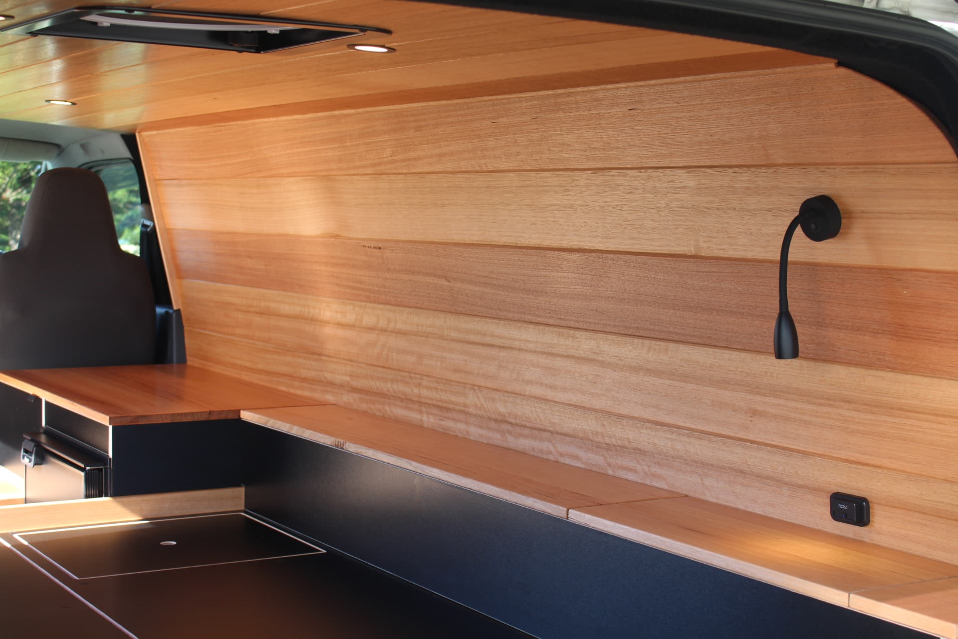 Hiace 200 Series Weekender — Long side bench with reading light and USB