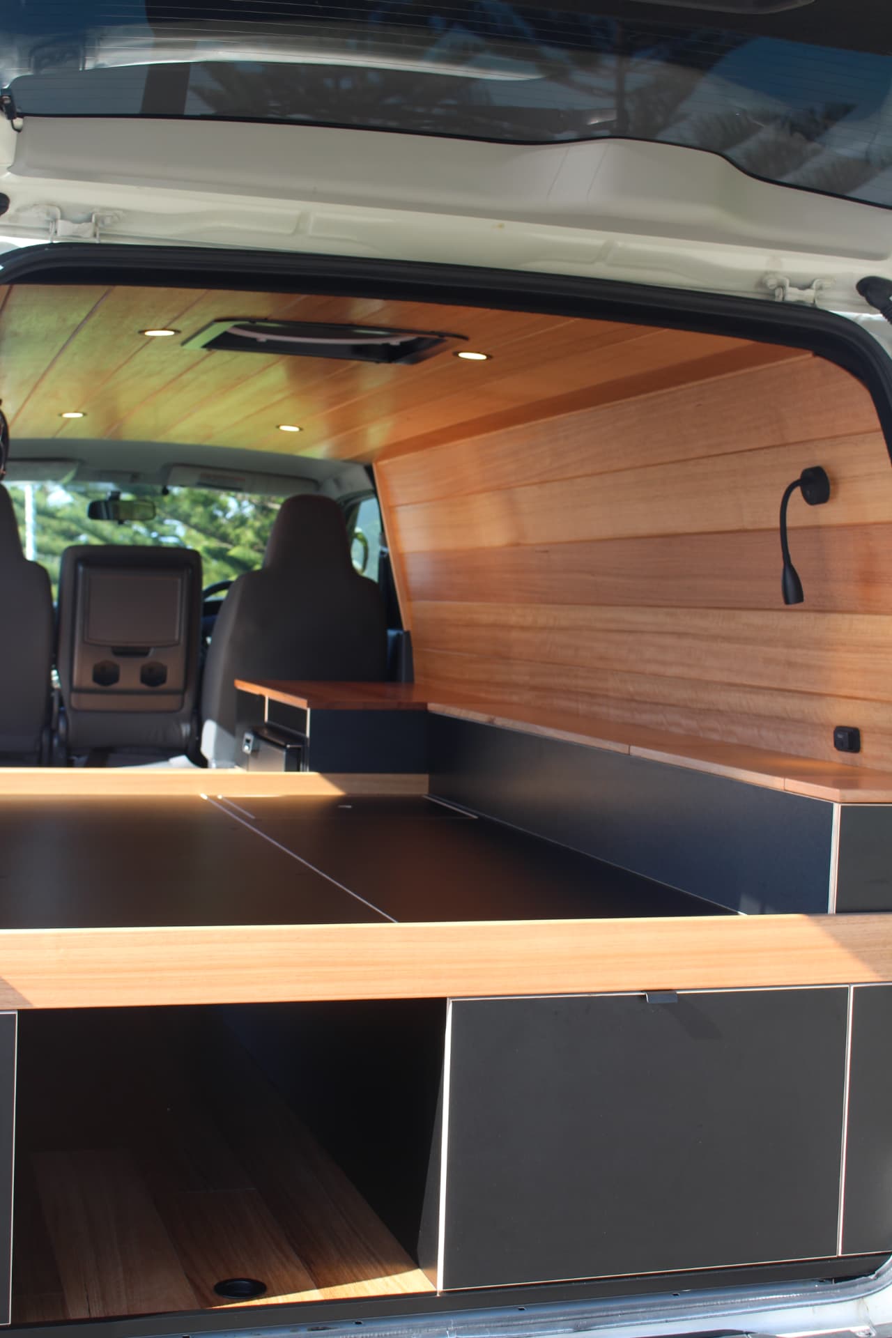 Hiace 200 Series Weekender — Timber ceiling, roof hatch and gooseneck light