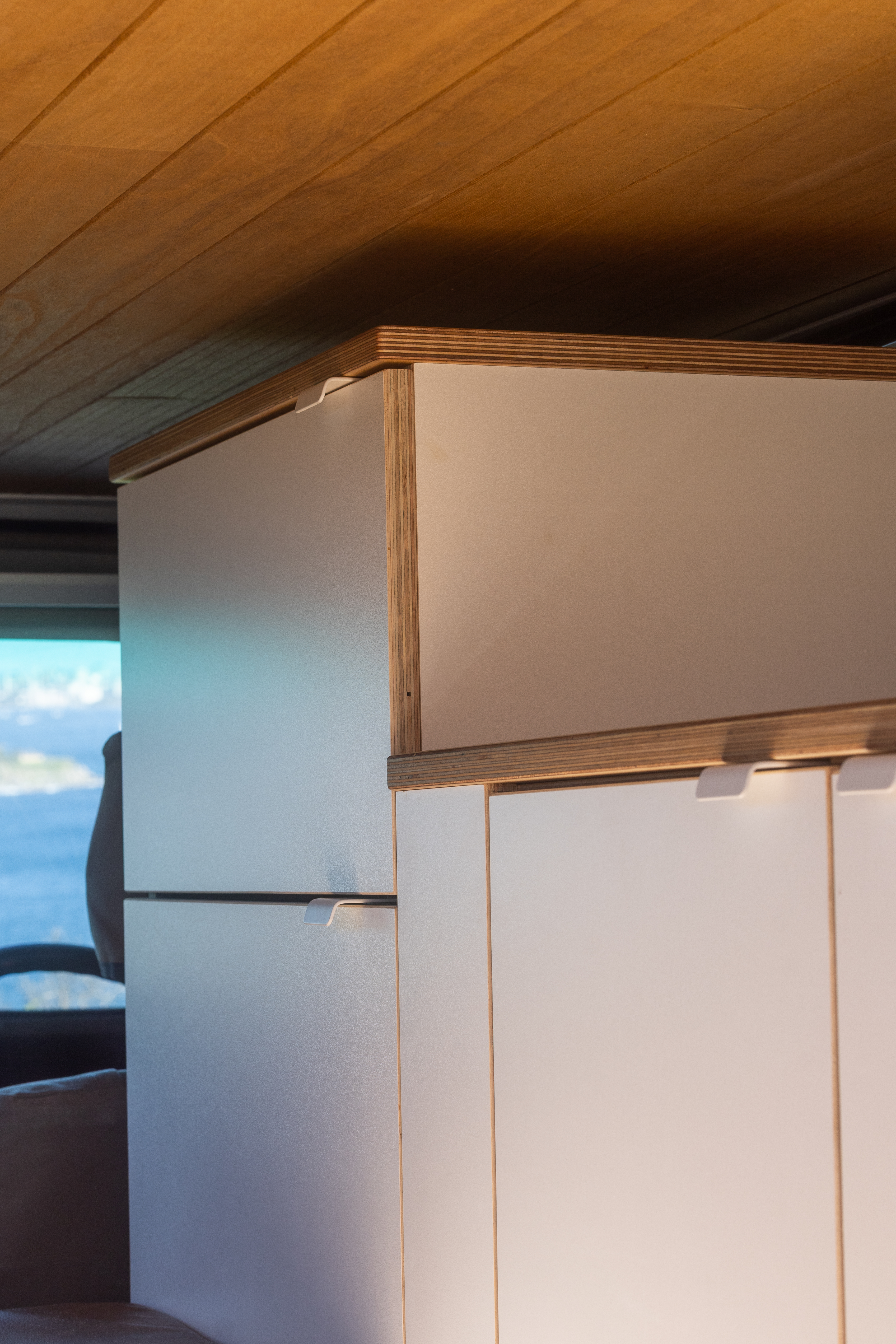 Toyota Troop Carrier — Upper cabinetry and timber-lined ceiling