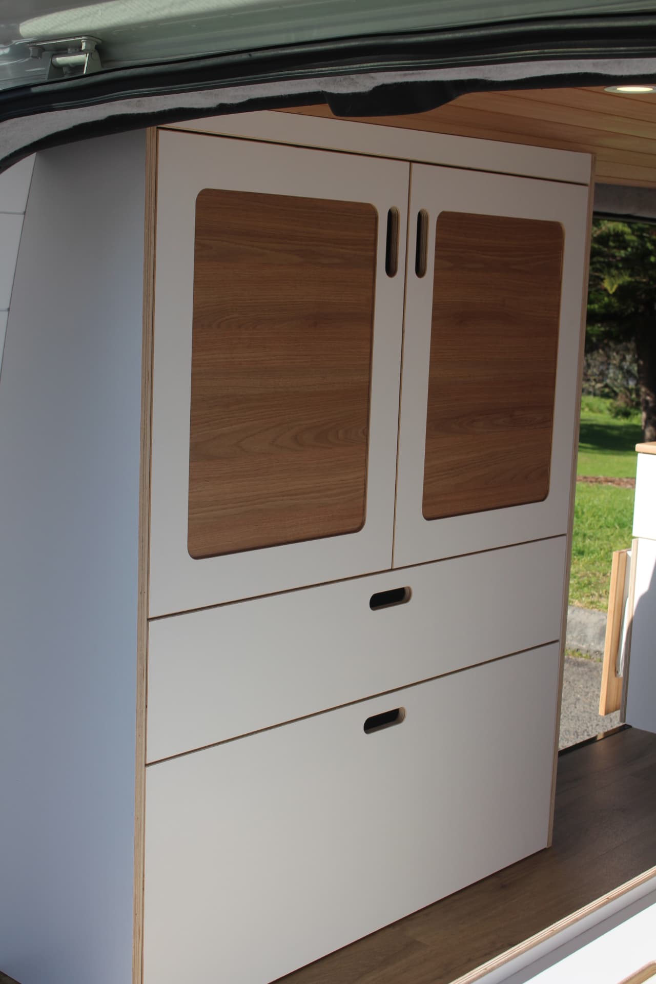 iLoad Camper — Timber-inlay cabinet doors and recessed pulls