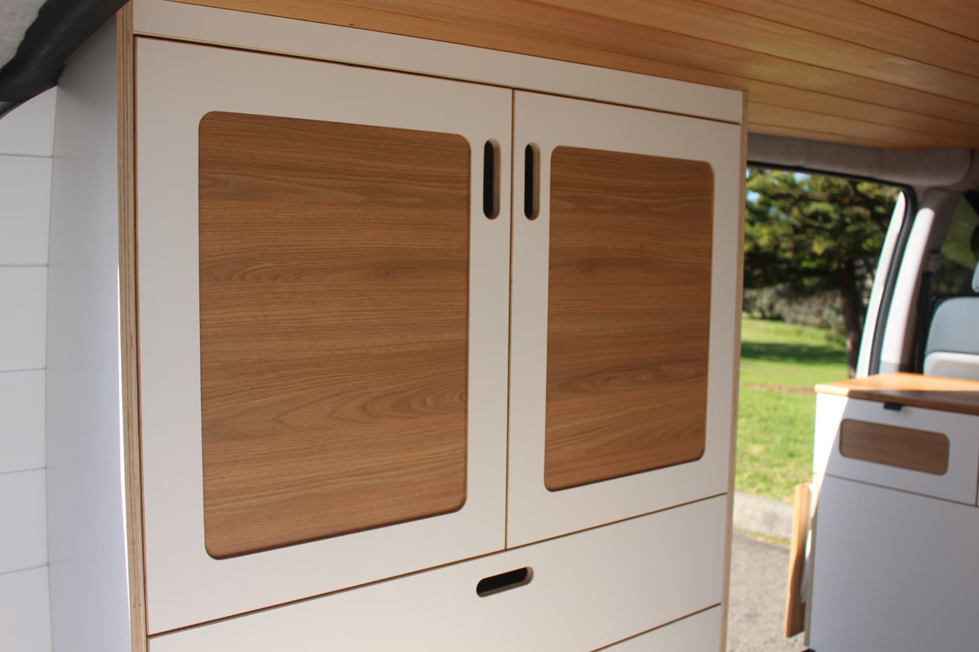 iLoad Camper — Overhead cupboards with timber inlays