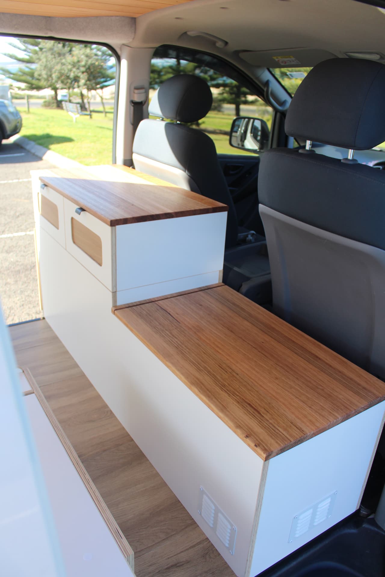 iLoad Camper — Bench seat and storage from the side door