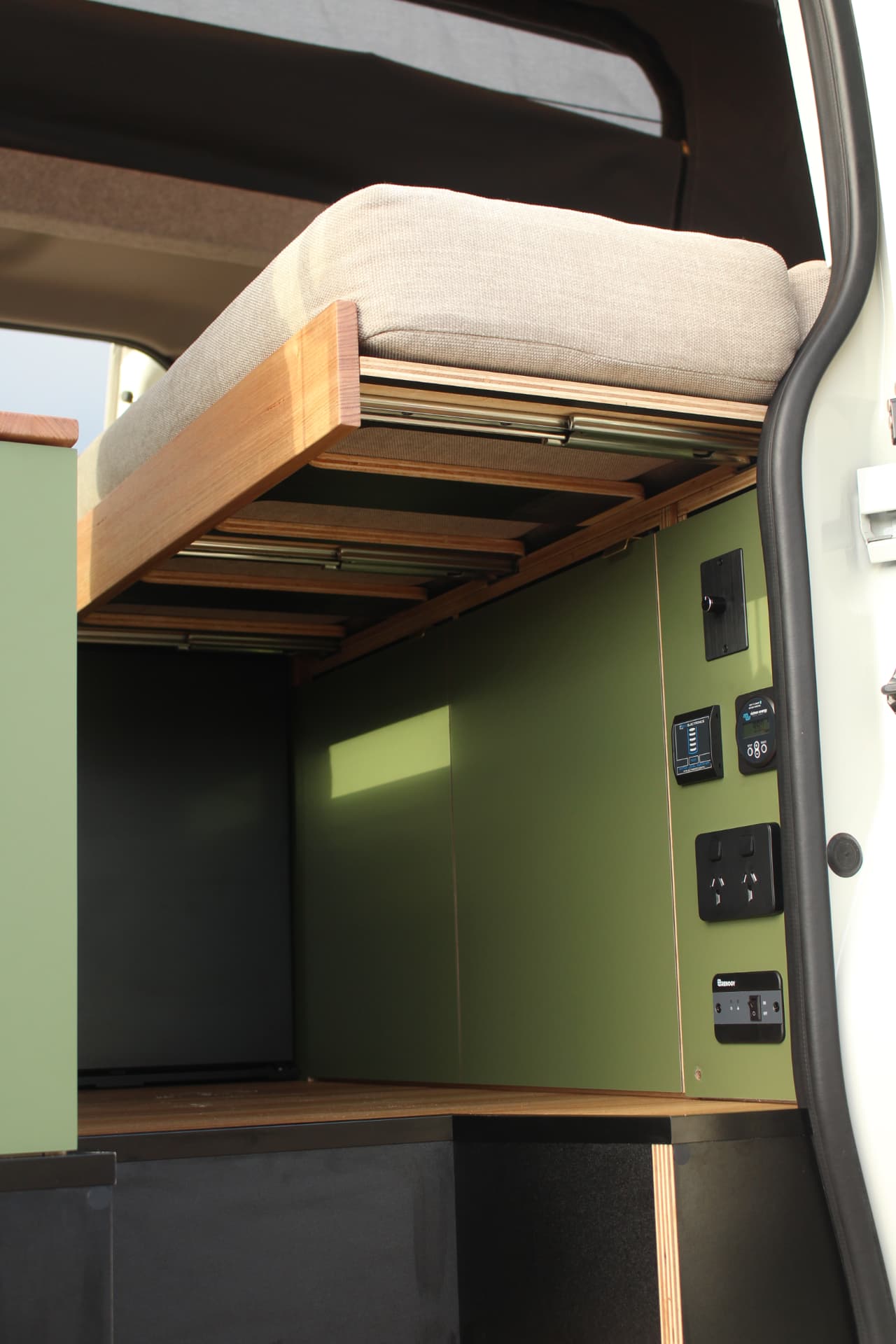 Toyota Hiace 300 Series — Slide-out bed extension and 12V control panel