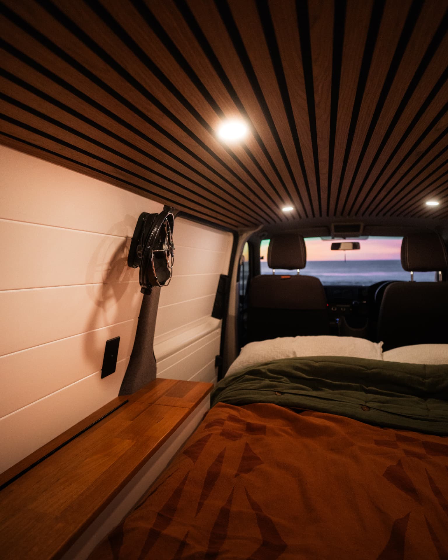 VW Transporter — Bed looking forward through to the sunset
