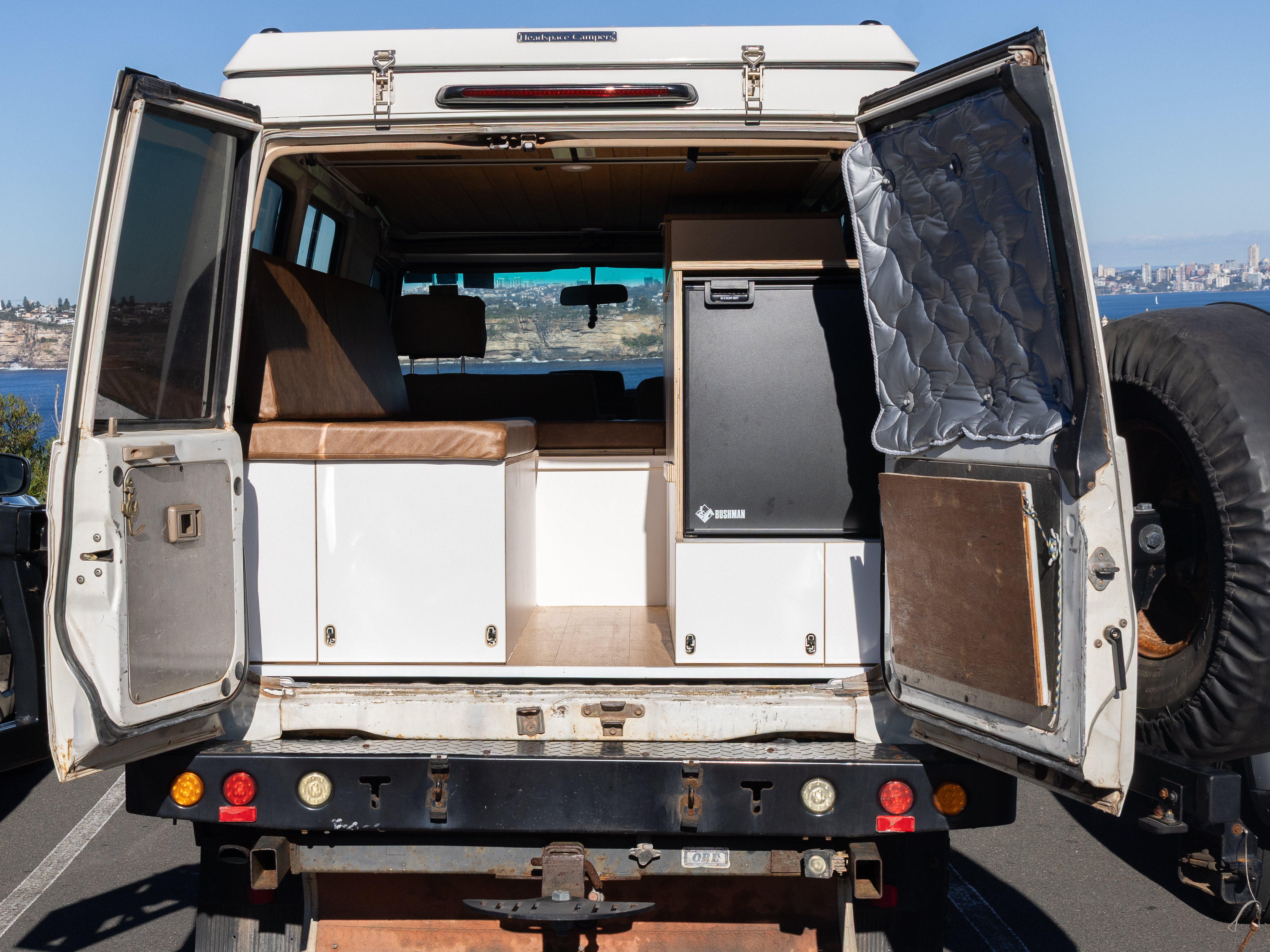 Toyota Troop Carrier — Rear open with the fridge slide in view