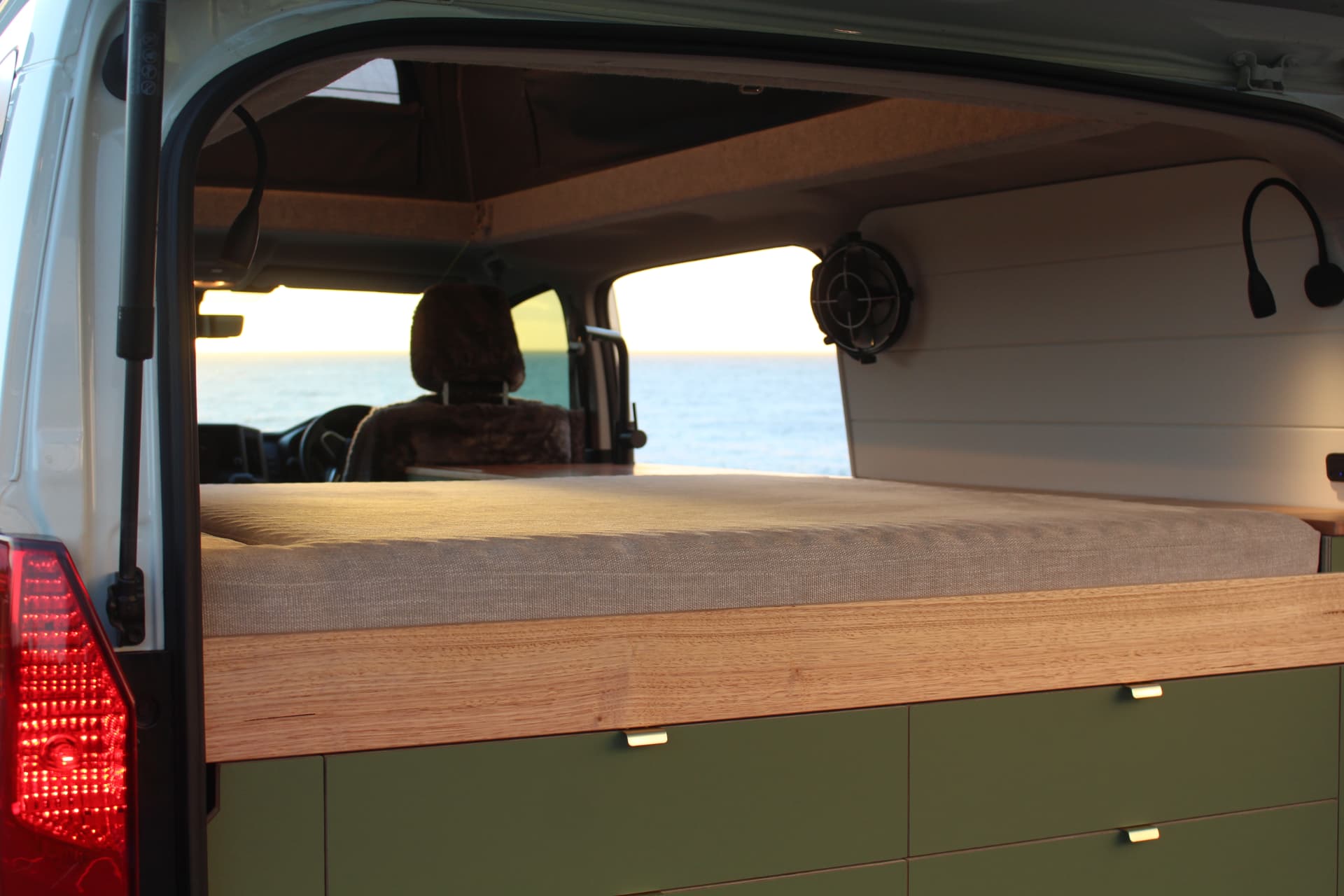 Toyota Hiace 300 Series — Bed made up, looking through to the front