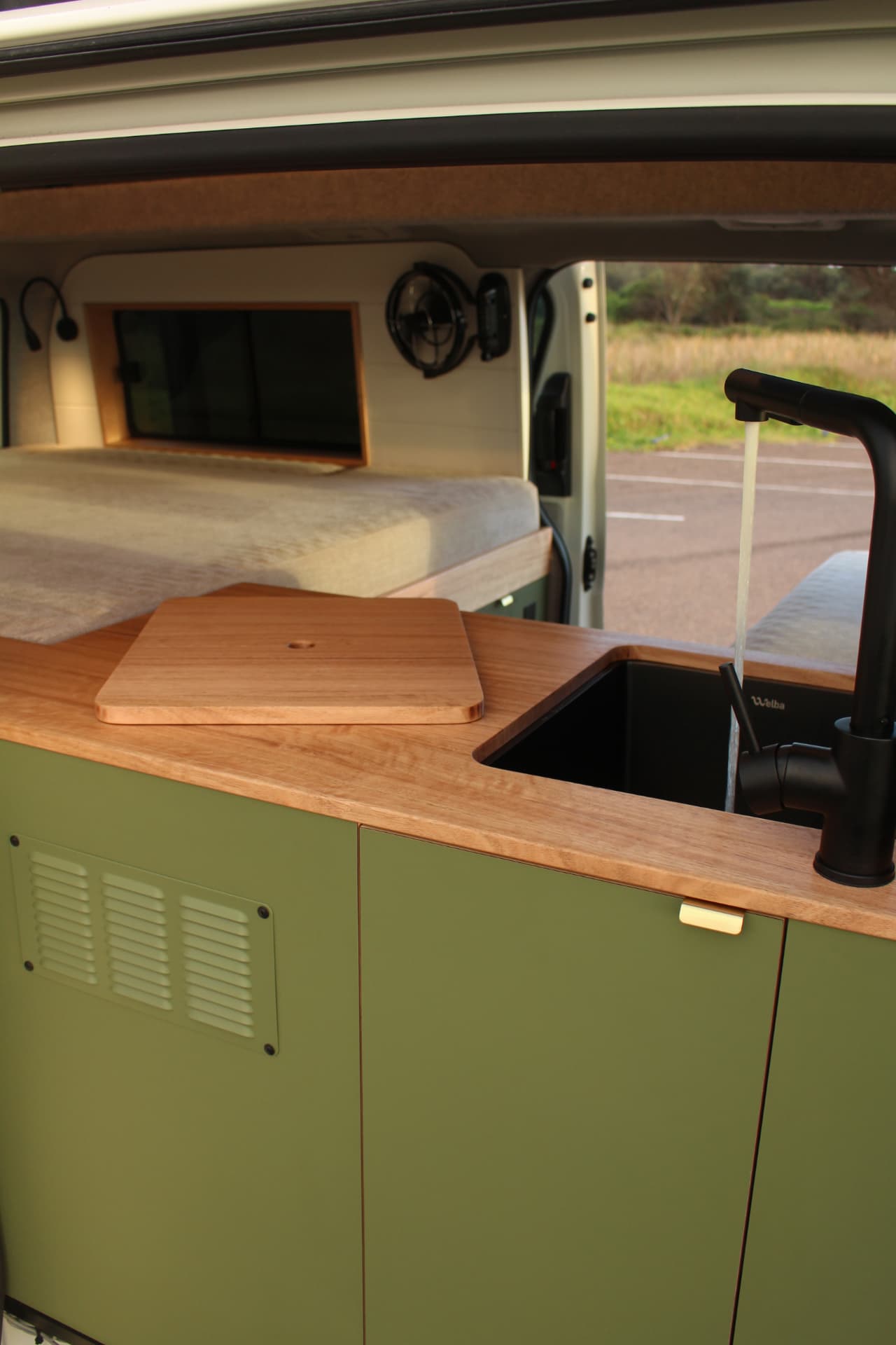 Toyota Hiace 300 Series — Kitchen with sink, chopping board and running water