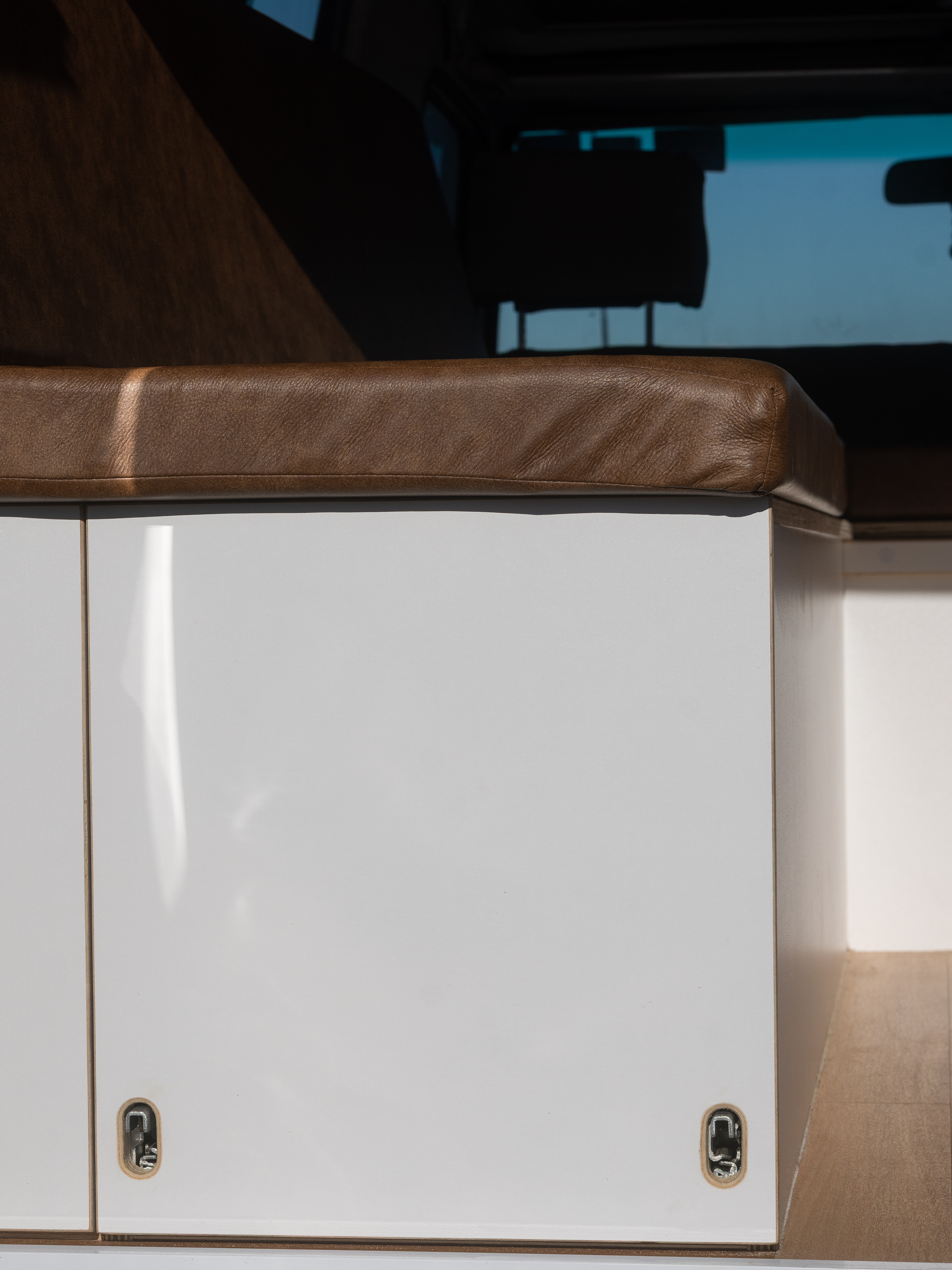 Toyota Troop Carrier — Bench seat front with catch detail