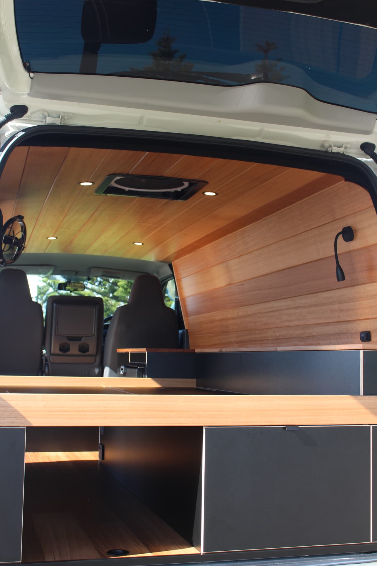 Hiace 200 Series Weekender — Bed platform and bench from the rear