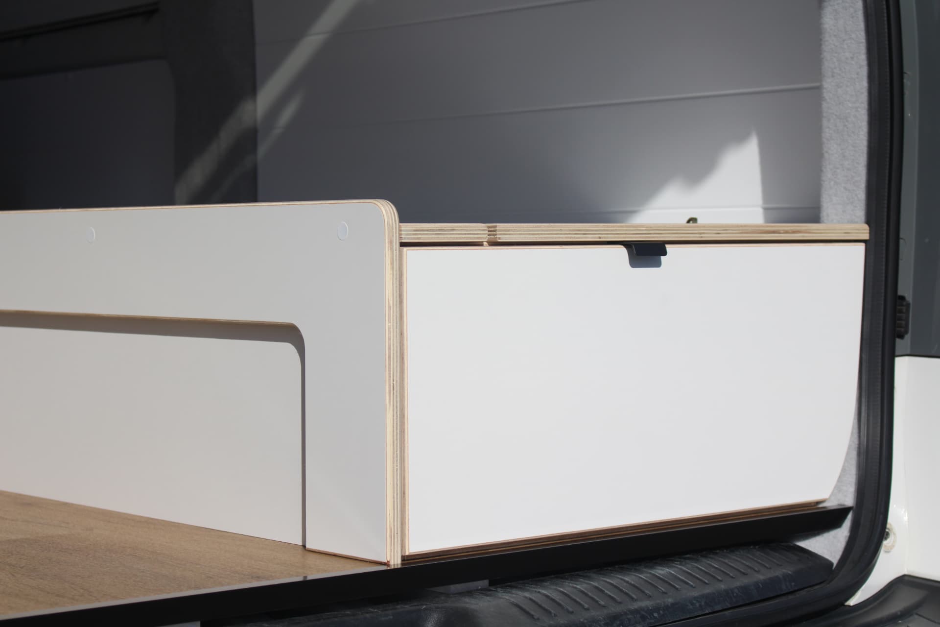 iLoad Camper — Rear storage box and bed edge