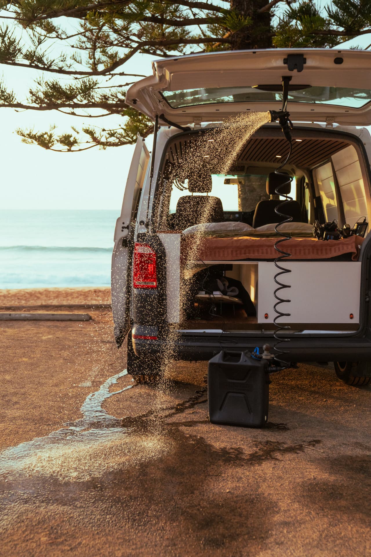 VW Transporter — Outdoor shower fed from the portable water tank