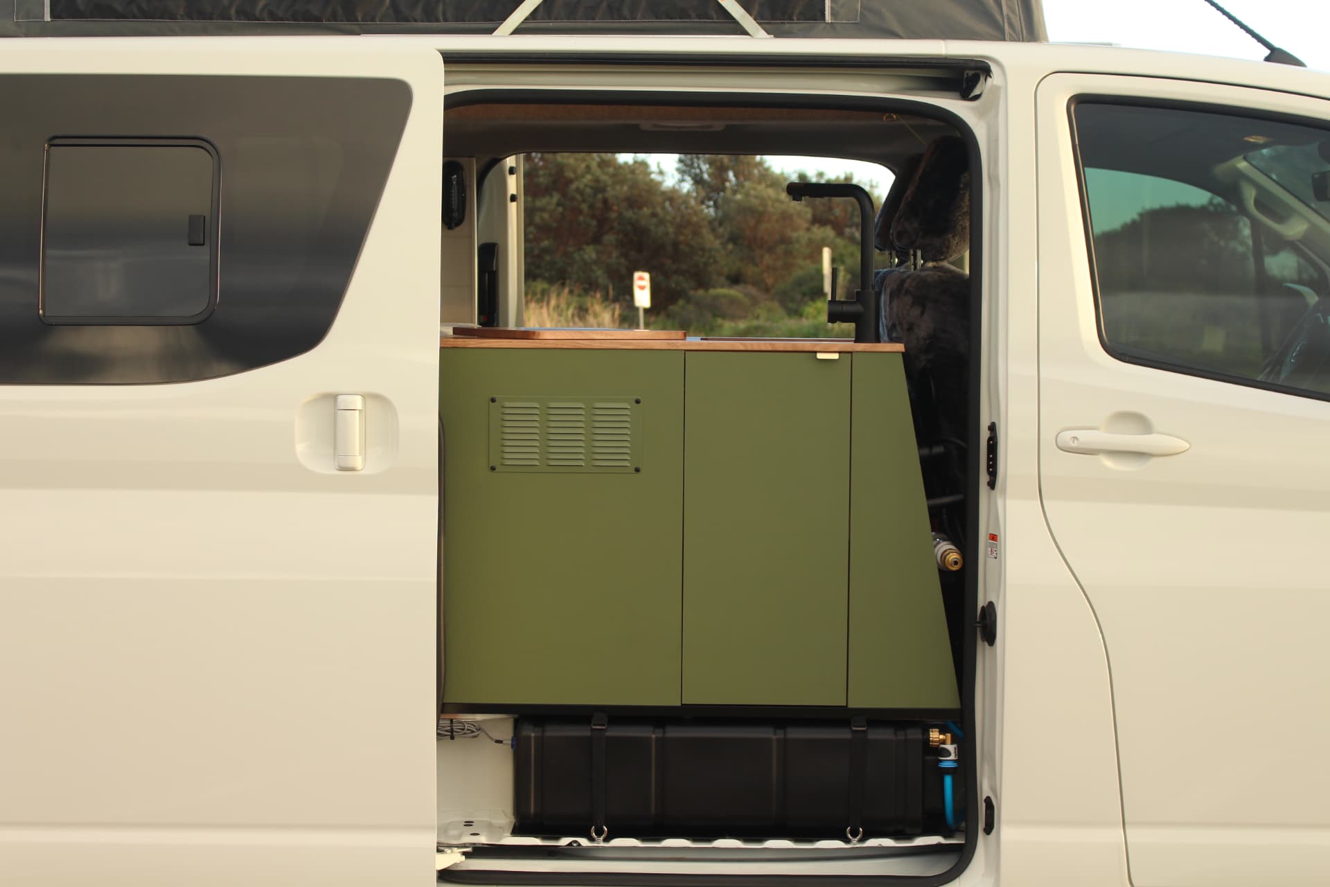 Toyota Hiace 300 Series — Olive joinery and hardwood top from outside