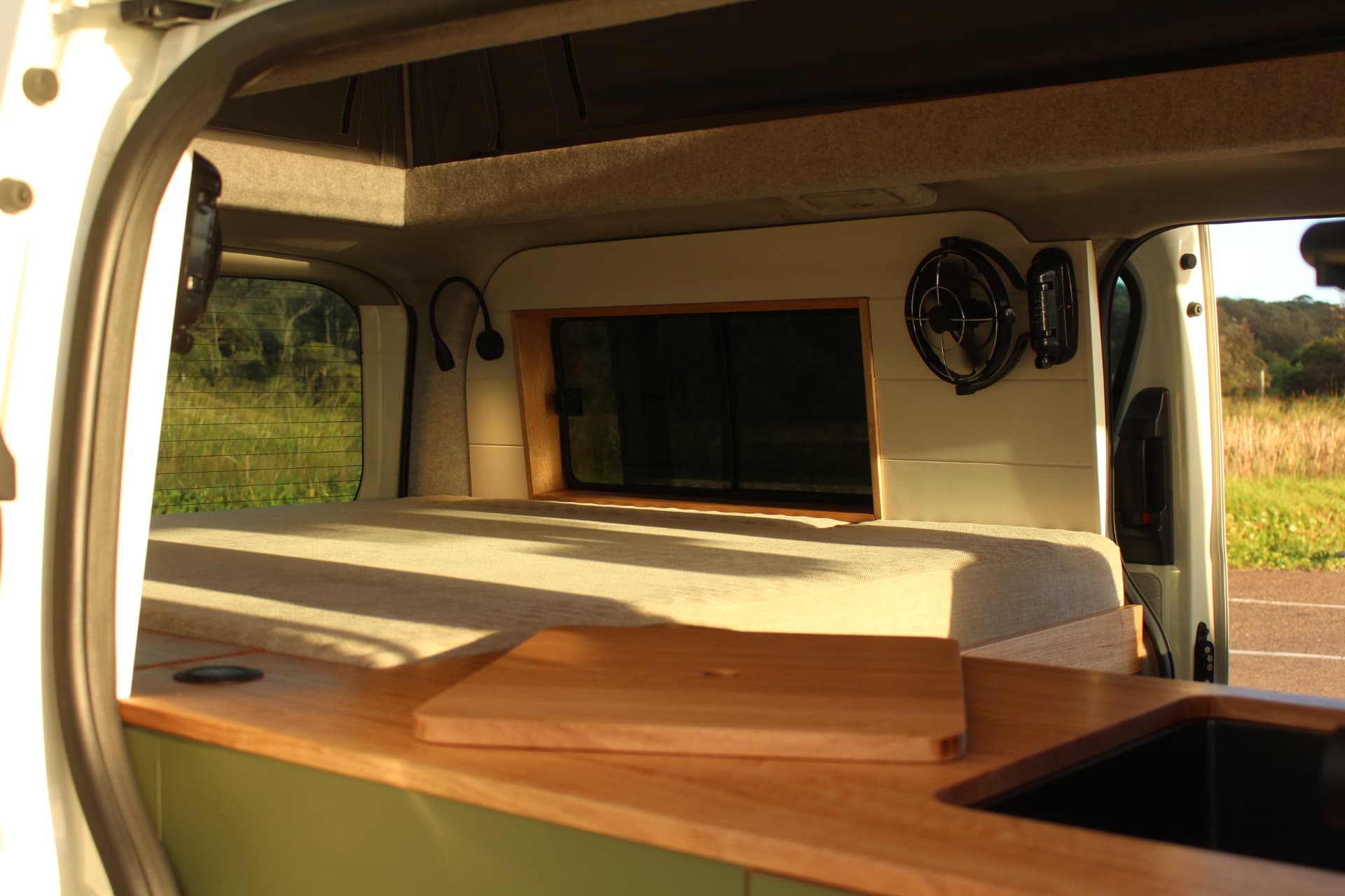 Finished HiAce fitout interior with custom cabinetry
