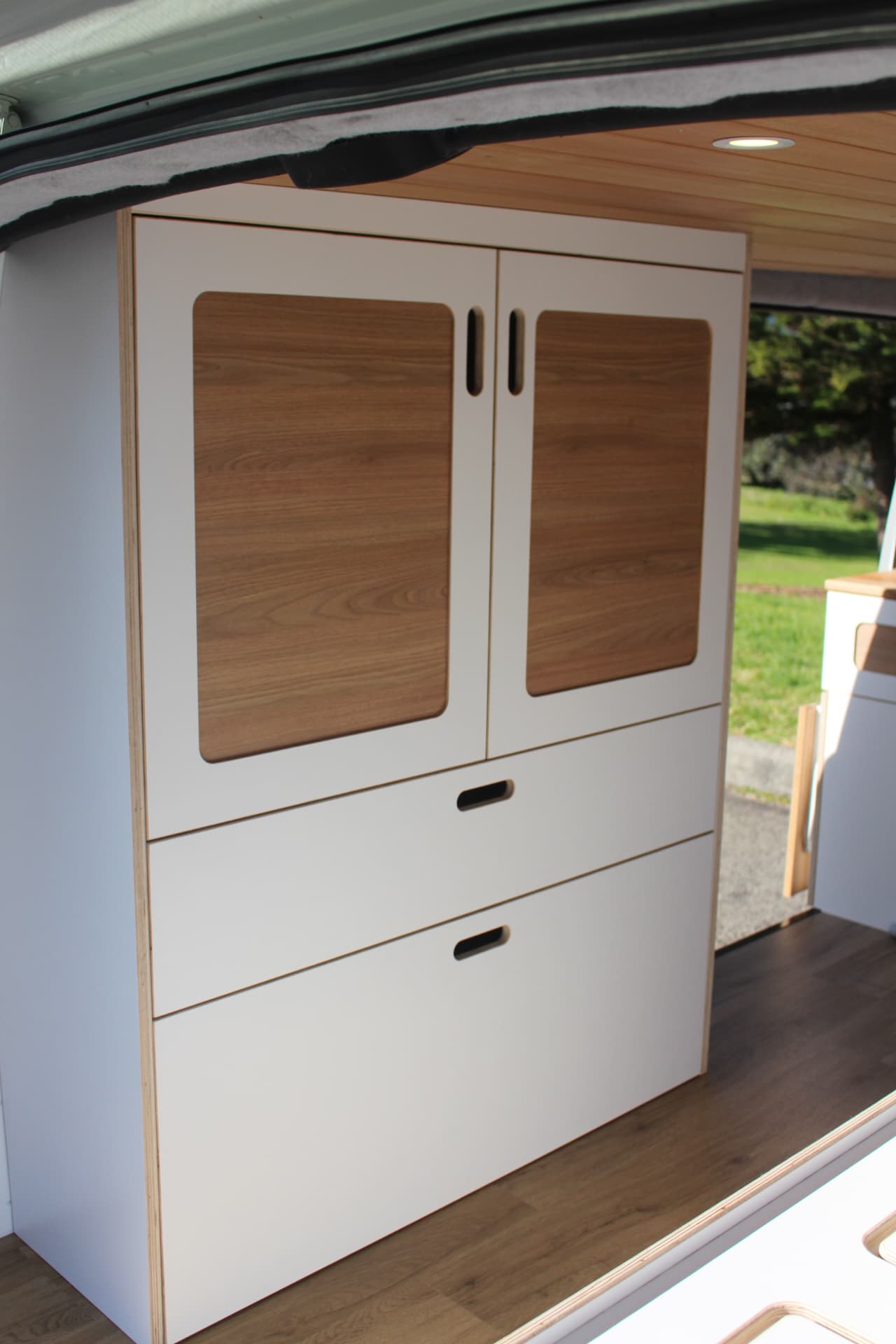 iLoad Camper — Wardrobe detail with the sliding door open