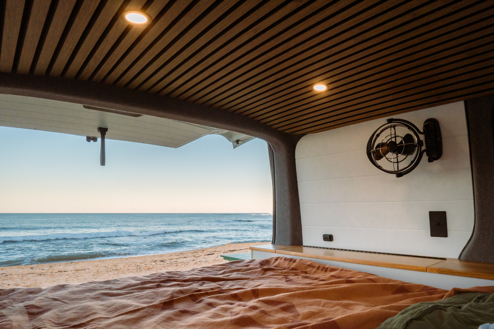 VW Transporter — Slatted oak ceiling and Sirocco fan looking straight out to the break