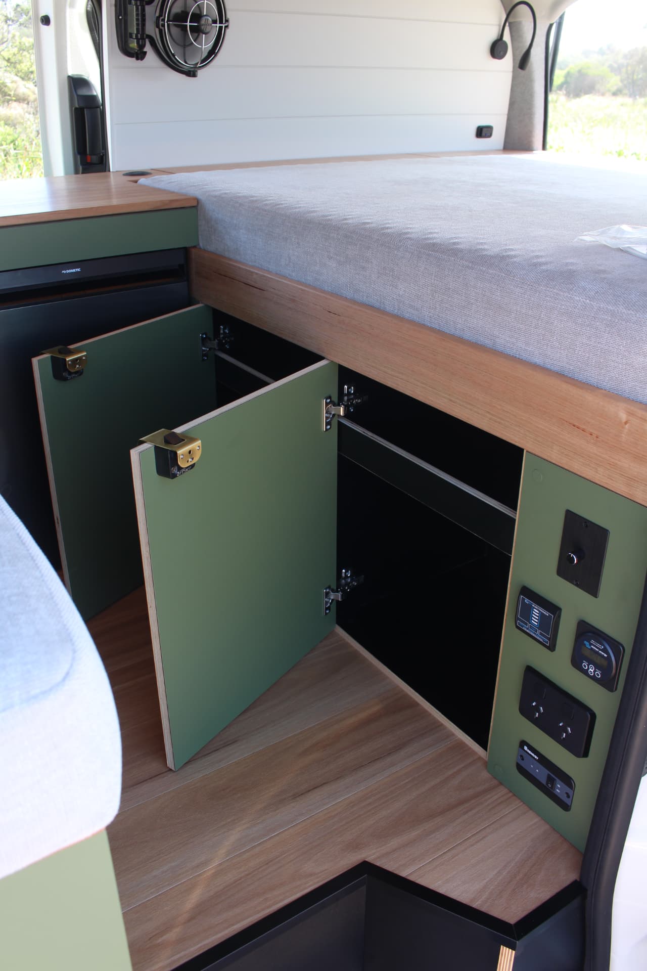 Toyota Hiace 300 Series — Soft-close hinges and full-depth storage behind the doors