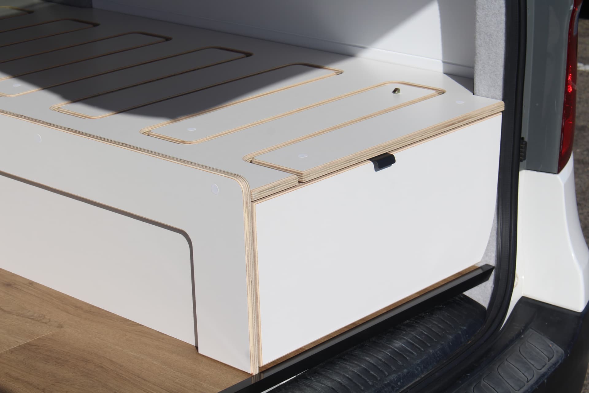 iLoad Camper — Bed platform with routed slat detail