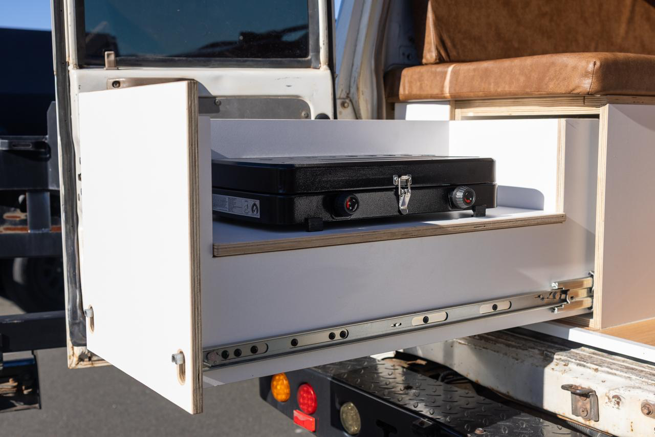 Toyota Troop Carrier — Pull-out kitchen drawer with the cooker in place